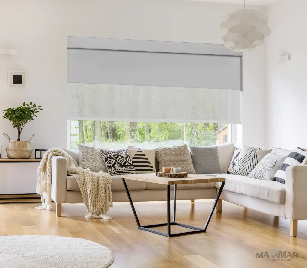 Semi-sheer white opera roller shade on a large living room window.
